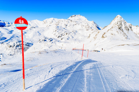 Red sign marking ski ride around whole Obertauern area Tauernrunde, Austria