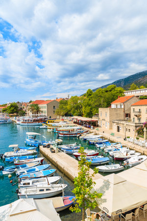 BOL PORT, BRAC ISLAND - SEP 8, 2017: View of Bol port with fishing boats, Brac island, Croatia.のeditorial素材