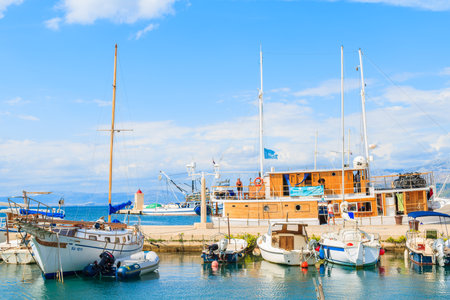 POSTIRA PORT, BRAC ISLAND - SEP 7, 2017: Fishing boats in Postira village with beautiful port, Brac island, Croatia.のeditorial素材