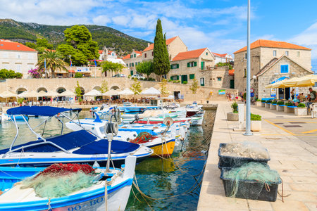 BOL PORT, BRAC ISLAND - SEP 8, 2017: View of Bol port with colorful fishing boats, Brac island, Croatia.のeditorial素材