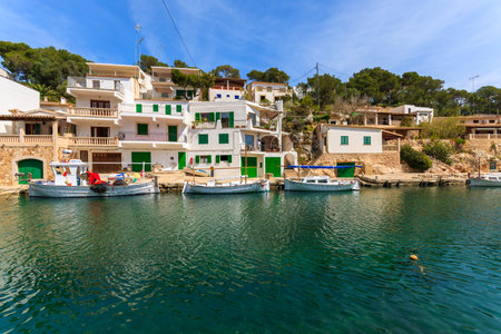 CALA FIGUERA, MAJORCA - APR 16, 2013: traditional llaut boats anchored in port of small fishing village of Cala Figuera on Majorca island.のeditorial素材