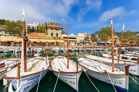PUERTO DE SOLLER, MALLORCA - APR 17, 2013: traditional llaut boats moored in port of old town of Soller, Balearic Island, Spain.のeditorial素材