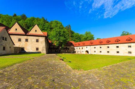 Red monastery in Spis village on bank of Dunajec river, Slovakiaの写真素材