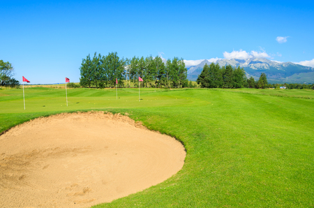 Golf course countryside view Tatra Mountains, Tatranska Lomnica, Slovakiaの写真素材