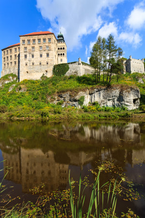 Beautiful Pieskowa Skala castle located by small lake, Polandのeditorial素材