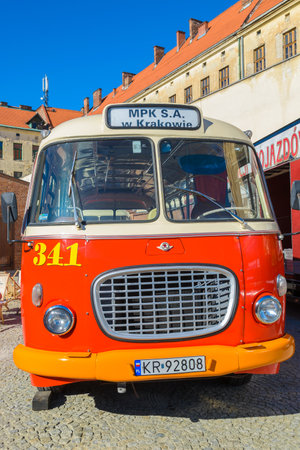KRAKOW, POLAND - 8 SEP, 2013: Red classic bus in depot in Krakow. These retro style vehicles are kept in a museum "Stara Zajezdnia" nowadays.のeditorial素材