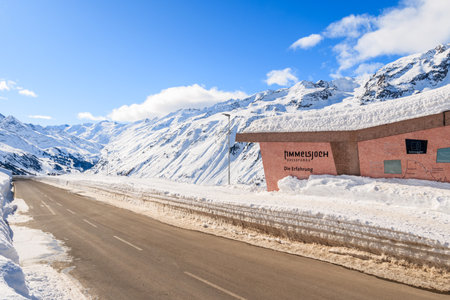 HOCHGURGL-OBERGURGL MOUNTAIN MUSEUM, AUSTRIA - JAN 31, 2018: Winter road to motorcycle museum in beautiful mountains in Hochgurgl-Obergurgl ski area, Tirol, Austria.のeditorial素材