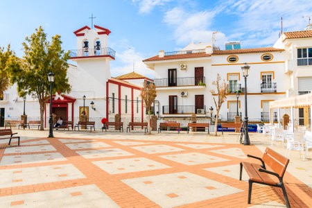 ANDALUSIA, SPAIN - MAY 10, 2018: Square with church and white houses in small white village. Olvera is located at the tip of the "White towns route" and belongs to the province of Cadiz, Spain.のeditorial素材
