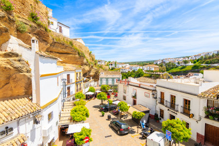 SENTINEL DE LAS BODEGAS, SPAIN - MAY 13, 2018: Street in beautiful white village with typical Andalusian architecture. Spain is second most visited by tourists country in Europe.のeditorial素材