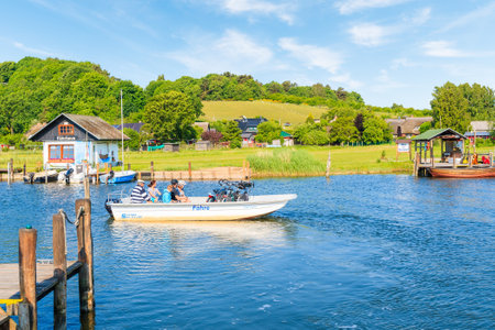 BAABE SAILING PORT, RUEGEN ISLAND - MAY 28, 2018: Ferry station in Baabe marina where cyclists can cross lake canal to Moritzdorf village, Baltic Sea, Germany.のeditorial素材