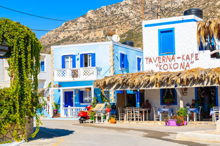 FINIKI PORT, KARPATHOS ISLAND - SEP 25, 2018: Typical Greek tavern in Finiki port on Karpathos island. Greece is very popular holiday destination in Europe.のeditorial素材