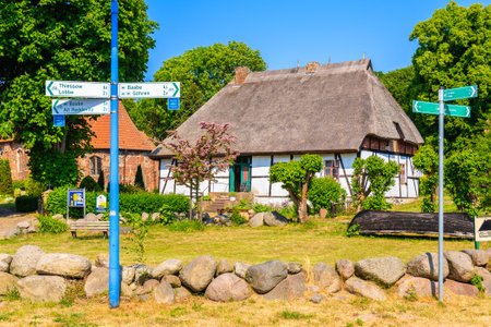MIDDELHAGEN VILLAGE, RUEGEN ISLAND - MAY 31, 2018: Shop located in traditional cottage house in Middelhagen village, Baltic Sea, Germany. Rugen is popular tourist destination in summer for Germans.のeditorial素材