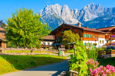 Traditional alpine houses in village of Going am Wilden Kaiser on beautiful sunny summer day, Tirol, Austriaのeditorial素材