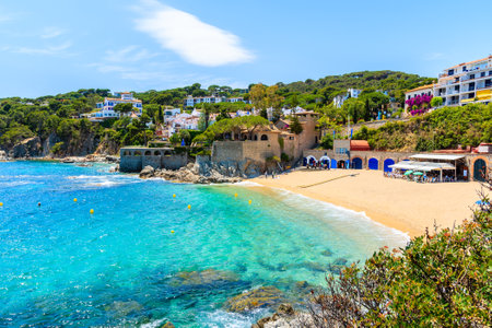 Amazing beach in Calella de Palafrugell, scenic fishing village with white houses and sandy beach...