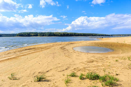 Beautiful sandy beach at Chancza lake in Swietokrzyskie region in central Polandの写真素材