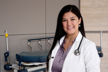 Portrait of young female doctor standing outsideの写真素材