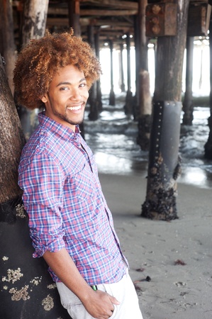 handsome young African American man at the beachの写真素材