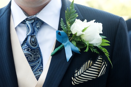 closeup of a ceremony suit with a flowerの写真素材