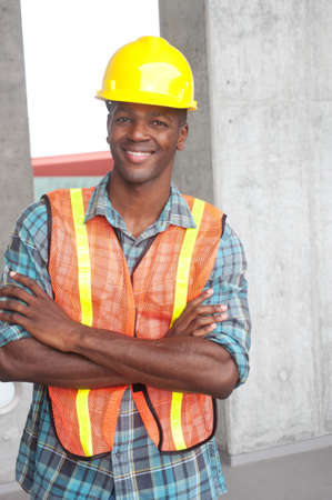 portrait of an African American construction worker on location