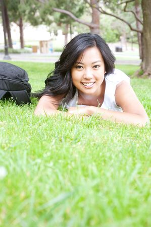 portrait of a pretty Asian college student on campusのeditorial素材