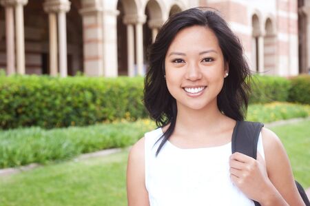 portrait of a pretty Asian college student on campusのeditorial素材