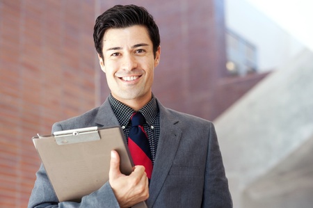 portrait of a young businessman looking at cameraの写真素材