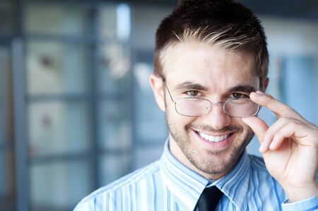 portrait of a handsome young businessman outside