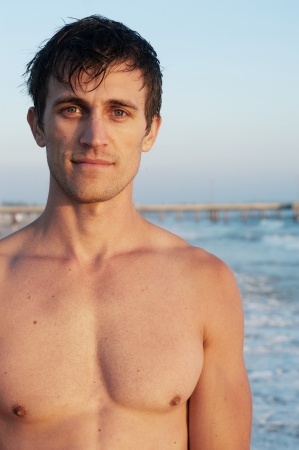 portrait of an active young man at the beachの写真素材