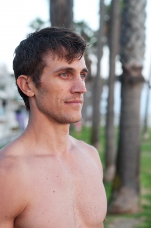 portrait of an active young man at the beachの写真素材