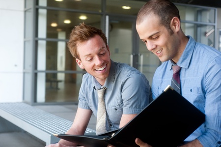 portrait of two young handsome businessmen shot on location
