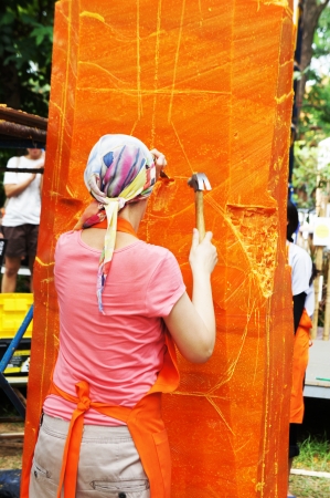 The Artist was carving candles in Ubon Candle Festival 2012               のeditorial素材