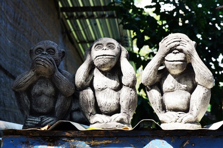 Monkey statue hand eye ear mouthの写真素材