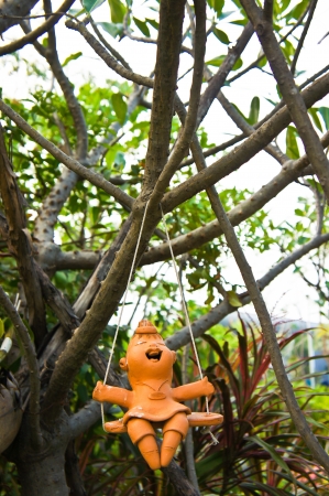 Ceramic dolls in the garden の写真素材