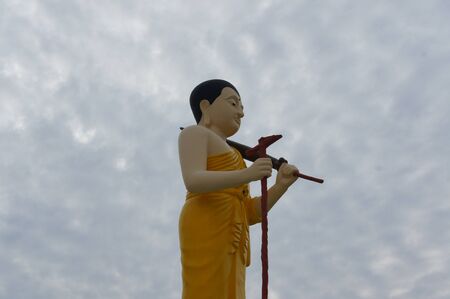 Buddha statue under blue skyの写真素材