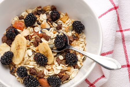 oat flakes with berries and dried fruitsの写真素材