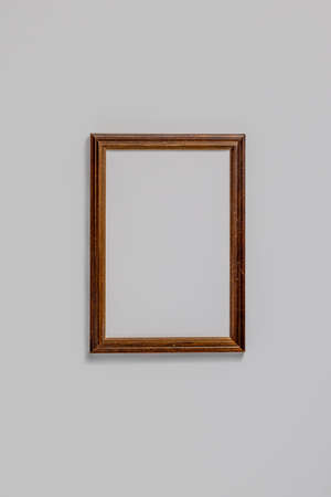 Empty brown wood border for photography, with craft paper isolated on white table background. Top...
