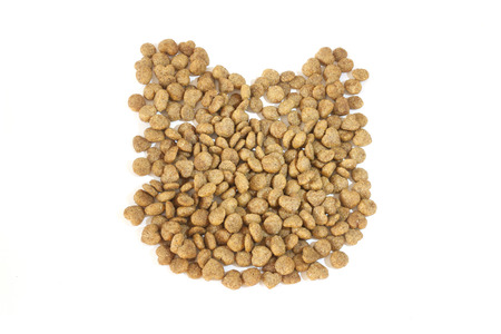 Dry cat food isolated on whiteの写真素材