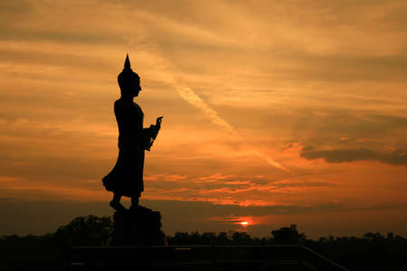 Buddha statue in silhouetteの写真素材