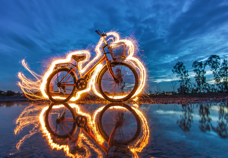 bicycle light painting reflectionの写真素材