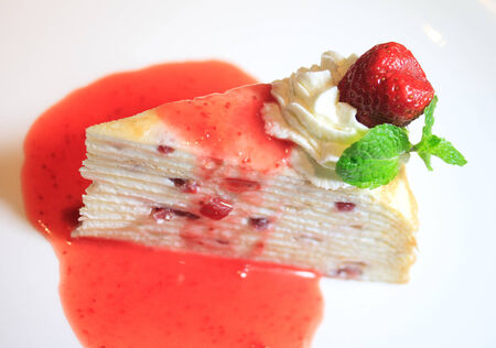 Strawberry cheesecake on table backgroundの写真素材