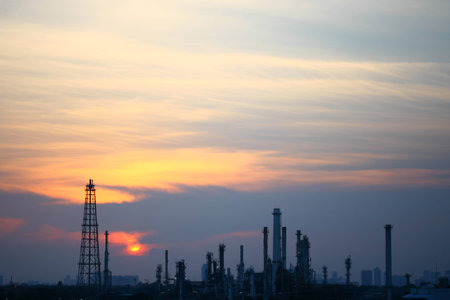 Oil refinery at sunsetの写真素材