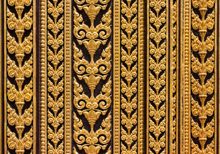 Thai art wall pattern in templeの写真素材