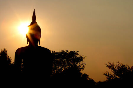 Big buddha statue at sunsetの写真素材