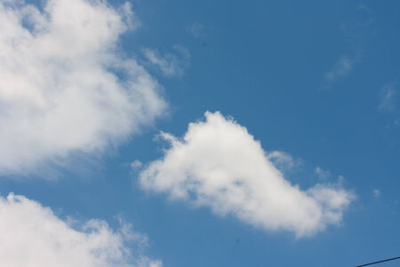 Photo frame on blue sky backgroundの写真素材