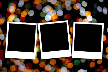 Blank photo frame on colorful bokeh backgroundの写真素材
