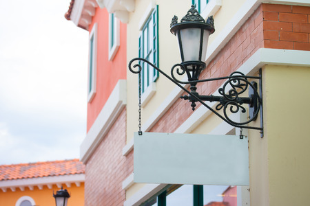 old italian lamp on colour wallの写真素材