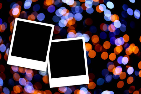 Blank photo frame on colorful bokeh backgroundの写真素材