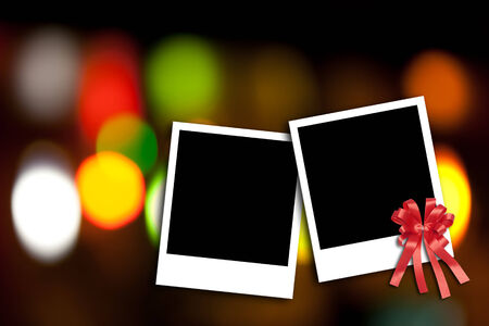 Blank photo frame on colorful bokeh backgroundの写真素材