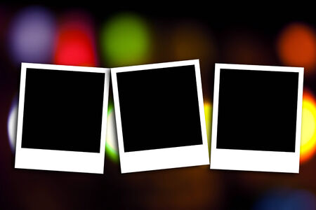 Blank photo frame on colorful bokeh backgroundの写真素材
