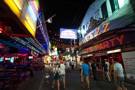PATTAYA, THAILAND - JANUARY 1, 2006: multicolored neon signs in the heart of the Walking Street of Pattaya. The street is closed to the traffic after 6pm and stays crowded until late in the night.のeditorial素材